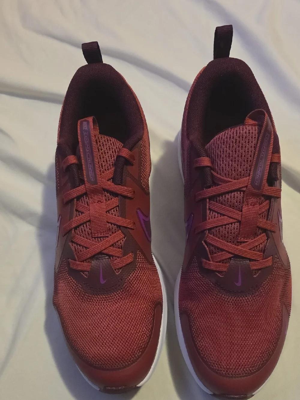 Nike Maroon Running Shoe with Pink Swoosh